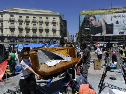Los manifestantes estuvieron cuatro semanas en la Puerta del Sol. AFP  /
