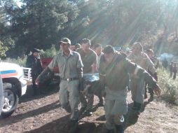 Elementos de Protección Civil del Estado participaron en las acciones de búsqueda y rescate del cuerpo. O. RUVALCABA  /