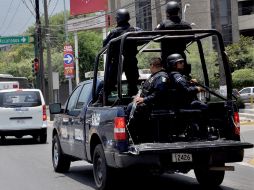 Se realiza un operativo en varias colonias y plazas públicas aledañas, ante posibles balaceras. AFP  /