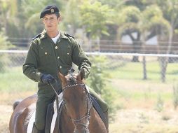 Abraham Ojeda, del Estado Mayor Presidencial, con ''Obusero'', logró el primer lugar de la prueba de adiestramiento. M. FREYRÍA  /