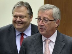 El presidente del Eurogrupo, Jean-Claude Juncker, y el nuevo ministro griego de Finanzas, Evangelos Venizelos. EFE  /