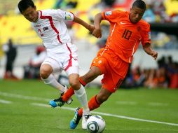 Jugadores de Japón y Holanda durante partido de Mundial México Sub-17 en Morelia. MEXSPORT  /