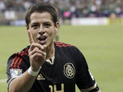 El delantero Javier Hernández celebra el segundo gol mexicano durante la prórroga. AP  /