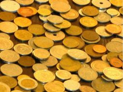 El precio del oro cayó brevemente a mínimos de sesión el jueves. ARCHIVO  /