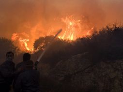 Los incendios en los bosques llevan a una liberación de bióxido de carbono. ARCHIVO  /