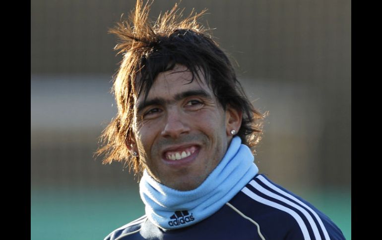 Tevez sigue sonriendo a pesar de su desición.AP  /
