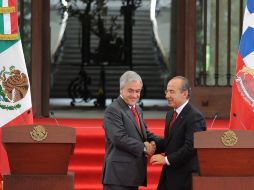 Sebastián Piñera y Felipe Calderón. México y Chile acordaron una mayor colaboración para abatir el narcotráfico. EFE  /