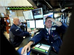 El Dow Jones se colocó en 12,519.80 unidades. ARCHIVO  /