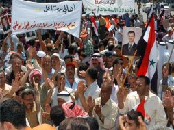 Cerca de siete mil anifestantes protestan contra el gobierno de Al Assad en la plaza  de Al Shohada. AFP  /
