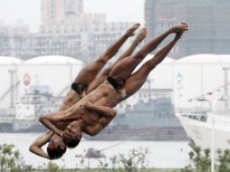 La dupla García-Sánchez culminó en el séptimo puesto de la especialidad del Campeonato Mundial de Natación. AP  /