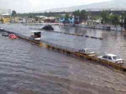 Las lluvias en Puebla han provocado daños en carreteras y viviendas. NTX  /