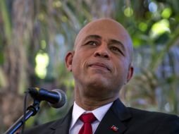 'Hoy quiero recordarles que aún estoy decidido a completar el proceso de la reconstrucción de Haití', declaró Martelly. ARCHIVO  /