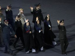 LA COI no permitió la vestimenta de la selección ya que llevan velo y sólo están descubiertas las manos. AP  /