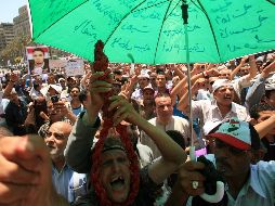 Manifestantes gritan consignas en diferentes plazas públicas. EFE  /