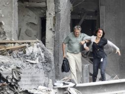 El acto terrorista contra el edificio sede del Gobierno de Oslo destruyó parte de la fachada. AP  /