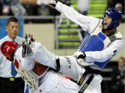 Salvador Perez (Azul) ganó en la categoría de 80 kg dentro del torneo. MEXSPORT  /