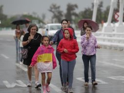 La tormenta tropical Dora estimula la entrada de humedad al país que favorece las lluvias. NTX  /