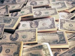 El peso osciló entre 11.6275 y 11.7213 unidades por billete verde. ARCHIVO  /