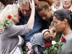 Más de 150 mil personas rindieron homenaje a las 76 víctimas mortales del doble atentado. EFE  /