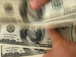 Casas de cambio de Guadalajara ubicaron al billete verde en una cotización máxima a la venta de 11.75 pesos por unidad. ARCHIVO  /