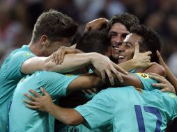 Thiago (D) celebra con sus compañeros la final victoriosa del la copa Audi ante el Munich. REUTERS  /