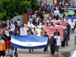 Integrantes de la Caravana realizan una protesta como parte de sus actividades en el municipio de Coatzacoalcos, Veracruz. EFE  /