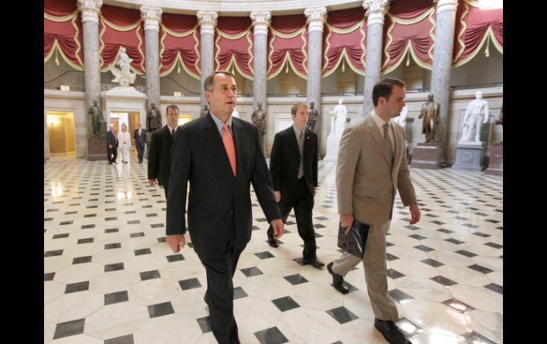 El proyecto aprobado fue impulsado por el presidente de la cámara baja, el republicano John Boehner (izq.). AP  /