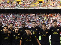 El equipo del Barcelona antes de que diera incio el partido contra el Manchester United. AP  /