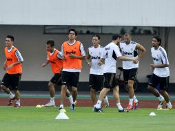 El líder de la liga china, Gangzhou, en entrenamientos antes del partido contra el Real Madrid. NOTIMEX  /