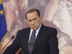 Silvio Berlusconi durante la rueda de prensa que ofreció junto al ministro de economía. EFE  /