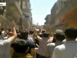Fotograma que captura a varios manifestantes en Siria. EFE  /