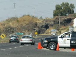 El hallazgo de los empleados fue realizado por agentes de la PF, quienes circulaban por la carretera Tepalcatepec-Buena Vista. ARCHIVO  /