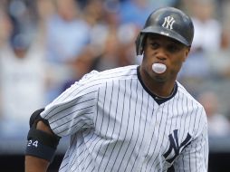 Robinson Canó se mostró feliz luego de poner al frente a los Yankees. AP  /