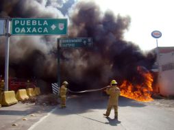 A pesar del incendio, el chofer sólo sufrió pequeñas lesiones. NTX  /