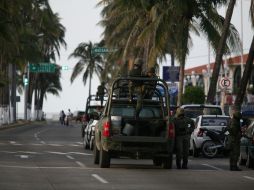 Intensifican la presencia militar para dar con los desaparecidos. EFE  /