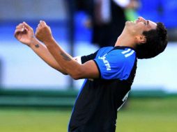 Carlos Bueno, de los Gallos Blancos de Querétaro, durante juego del Torneo Apertura 2011. MEXSPORT  /