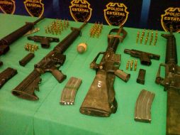 En la foto, armas decomisadas por policías estatales en Quitupan, Mezquitic y Totatiche. M. PATIÑO  /