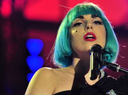 La artista aparecerá con el pelo azul y vestida con un mono de color rojo. AFP  /