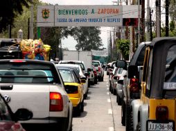 El congestionamiento en Lázaro Cárdenas por la restricción de un carril. A. HINOJOSA  /