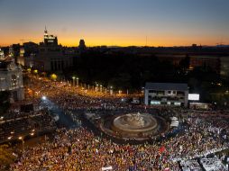 Una multitudinaria misa en la Plaza de Cibeles marcó el incio de la Jornada Mundial de la Juventud 2011. AP  /