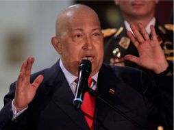 Hugo Chávez anunció la nacionalización de proyectos auríferos en minas de Venezuela. AP  /