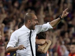 Josep Guardiola celebra el triunfo del equipo español ante su rival de Madrid. REUTERS  /