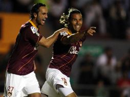 Leaño y Zamogilny celebran el primer gol del partido. MEXSPORT  /