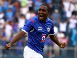 El jugador Edixon Perea celebra el triunfo de su equipo durante la sexta jornada del Apertura 2011.MEXSPORT  /