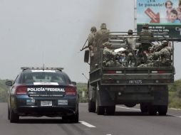 Militares y policías federales arribaron ayer a la ciudad para reforzar la seguridad ante la cercanía de los Panamericanos. A. HINOJOSA  /