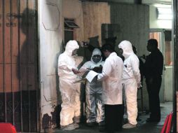 Personal del Semefo trabaja en la identificación de los cuerpos localizados en las fosas de San Fernando, Tamaulipas. REUTERS  /