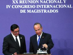 El Presidente Calderón anunció la puesta en marcha de los juicios por Internet en el TFJFyA. EFE  /