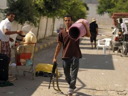 En los disturbios se sucitan saqueos y destrozos en ciudades clave de Libia. AFP  /