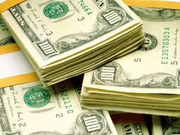 En bancos de la capital mexicana, el dólar quedó en 12.60 pesos a la venta. ARCHIVO  /