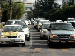 La caravana llegó a hasta la residencia de Aristóteles Sandoval, sin embargo, su secretario enfrentó a los manifestantes. A. HINOJOSA.  /